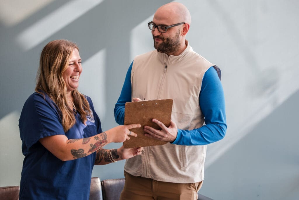Massage therapy student receiving certificate