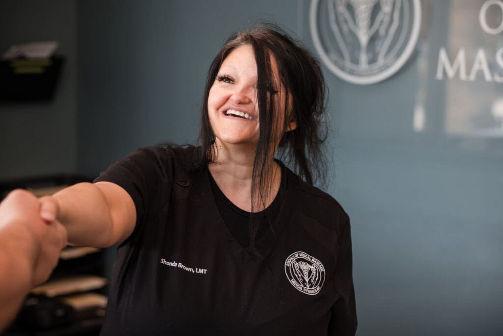 A receptionist at a Schools of Medical Massage clinic