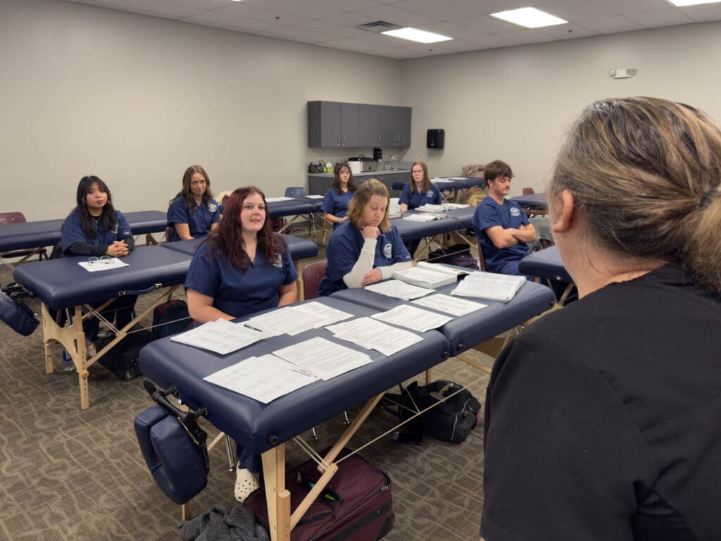A classroom at SOMM with students and an instructor
